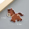 Close up view of cute brown horse embroidered cloth patch showing delicate texture and details. - Cartoon Pony Style 5