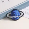 Detailed view of the blue sequin saturn embroidery patch, perfect for clothing and bag decor. - Planet Pattern Style