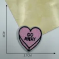 Detailed view of the pink heart embroidered patch featuring GO AWAY text, sized 3.7x4cm for DIY. - Style 15