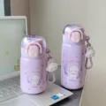 Detail shot of cute purple children thermos straw water bottle with lovely lamb pendant. - 350ml / Purple