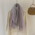 Detailed view of the draped vintage striped scarf showing textured fabric and soft color. - Light Purple