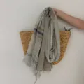 Detail shot of lightweight retro striped scarf with fringe, breathable fabric texture. - Olive Green