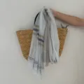Detailed view of lightweight vintage striped scarf showcasing texture and drape design. - Light Gray