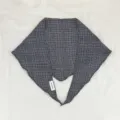 Detailed view of black and white houndstooth triangular scarf, soft cotton linen fabric. - Black