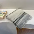 Cozy striped scarf with frayed fringe edges, soft neutral tones, perfect winter warm fashion accessory. - Off White