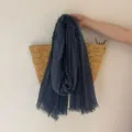 Retro dark blue striped frayed scarf detail view, elegant lightweight fashion accessory. - Blue