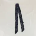 Detailed view of a vintage paisley skinny scarf, showcasing the dark blue patterned fabric. - PDXJ-Youman Navy / 100*5cm