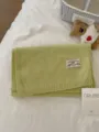 Cozy knit scarf with woven patch detail, soft and warm solid color winter accessory for women. - Yellow-Green