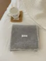 Cozy winter thick knit grey scarf with white edge detail, warm fashion accessory. - Light Gray