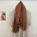 Solid color textured scarf with fringe edges, lightweight autumn and spring fashion accessory. - 180x60cm / Brick Red