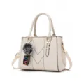 Stylish women handbag off white top handle shoulder bag with furry charm and gold hardware - Off White