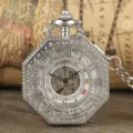 Silver vintage mechanical pocket watch detail, octagonal skeleton dial with Roman numerals. - Silver