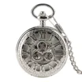 Vintage silver mechanical pocket watch with hollow gear design and Roman numerals. - Silver