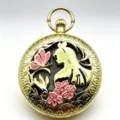 Golden vintage pocket watch music box featuring Alice silhouette and delicate floral design. - Watch Only / Gold