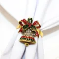 Christmas rhinestone bell napkin ring detail shot showing red and green crystal sparkle. - Bell / Antique Gold