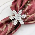 Silver rhinestone snowflake napkin ring detail shot, perfect for elegant holiday table decor. - 16