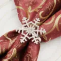 Silver rhinestone snowflake napkin ring detail shot, elegant holiday table decor accessory. - 17