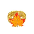 Gold metal spring curtain tieback with vibrant orange enameled maple leaf detail. - Orange