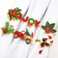 Set of 6 Christmas napkin rings featuring festive metal designs like bells, trees, and candy. - 9/6PCS