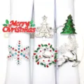 Set of 6 Christmas napkin rings featuring reindeer, trees and snowflakes for holiday table decor. - 16/6PCS