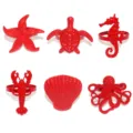 Set 6 portatovaglioli animali marini rossi dettaglio, metallo stella conchiglia. - Collezione marina / Rosso