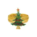 Close-up of gold metal spring curtain tieback featuring a green rhinestone Christmas tree. - Green