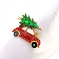 Close-up detail of Christmas car napkin ring featuring metal tree and rhinestones. - 27