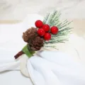 Christmas napkin ring with pine cones and red berries, rustic holiday table decor style. - 30