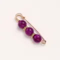Gold-toned safety pin brooch featuring purple marbled beads and rhinestones for waist adjustment. - 5.8cm / Purple