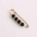 Golden safety pin brooch with black beads and crystal spacers for waist tightening clothes. - 5.50cm / Black