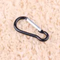 Black aluminum gourd carabiner clip, durable snap hook for outdoor gear and power bank hanging. - Black