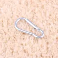 Aluminum alloy gourd shaped carabiner detail view, durable outdoor quick snap hook design. - Silver