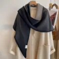 Detailed view of a stylish double-sided color block triangle shawl with black border. - HSJ-2-Black Gray