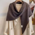 Close-up detail of the cozy vertical striped triangle shawl scarf, soft texture. - HSJ-3-Gray Brown