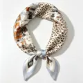 Silk square scarf featuring leopard print and fashion illustration design, elegant and chic. - Brown Orange Cartoon Character