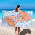 Detailed view of quick-dry beach towel with cute crab print showcased in a sunny seaside background. - 70*140cm / HSTJ34-3
