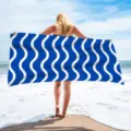 Detailed view of the blue and white wave printed quick-drying polyester beach towel. - Blue and White Wave