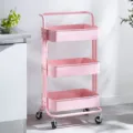 Pink 3-tier metal rolling utility cart storage trolley for kitchen, living room, and nursery. - Pink