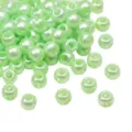 Light green pearlescent acrylic four-hole beads, perfect for DIY jewelry making and crafts. - 10 Pieces/Pack / Green