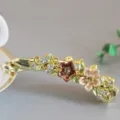 Gold tone enamel flower rhinestone banana clip hair accessory for elegant women hairstyles. - Coffee