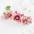 Detailed close-up of a large Korean alloy rhinestone flower hair clip design. - Style F011171 / Pink