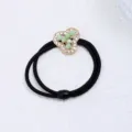 Élégant élastique à cheveux noir double brin avec strass dorés et perles vertes, 2cm. - Perles Vertes