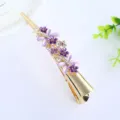Gold alloy hair clip detail featuring purple enamel flowers and sparkling rhinestones. - H009317 Purple