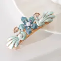 Pince à cheveux exquise en alliage avec design élégant de paon et de fleurs perles et strass. - Bleu