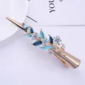 Pince à cheveux élégante en alliage doré avec fleurs émaillées bleues et strass pour femmes. - H009312 Bleu
