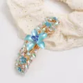 Korean style alloy floral spring hair clip decorated with sparkling rhinestones and blue enamel. - Style F011163 / Blue