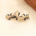 Élégante pince à cheveux papillon en émail noir et perles, barrette en alliage chic. - Noir