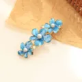 Barrette à cheveux fleur émail bleu avec perles et strass, élégant pince en alliage d'or. - Bleu
