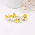 Chic floral hair clip with enamel petals, pearls and rhinestones for elegant hairstyles. - F014683 Yellow
