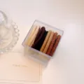 Seamless high elasticity hair ties set in assorted neutral colors with transparent box storage. - Snake Print Style